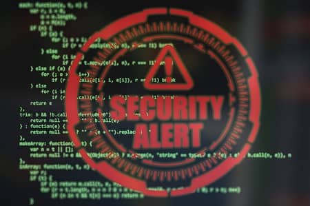 Eine Programmierung ist zu sehen die mit einer großen Einblendung "Security Alert" überblendet wird